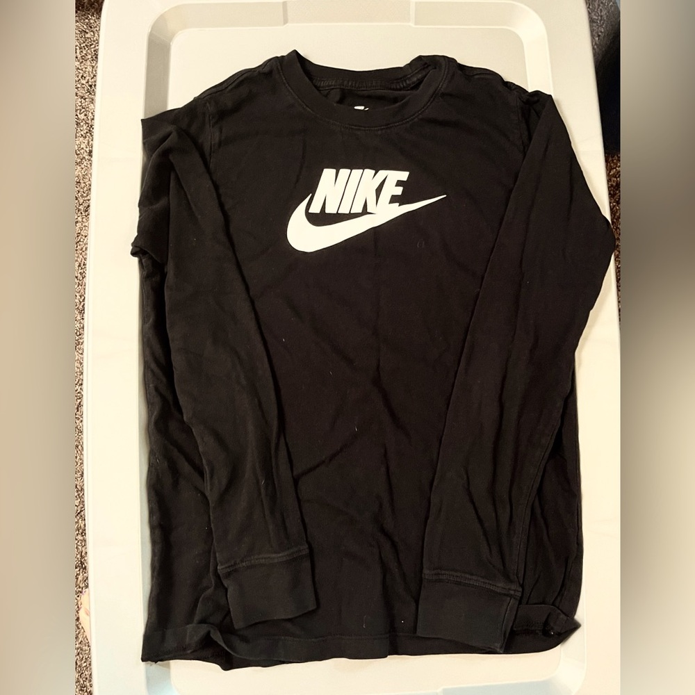 Nike youth size youth XL black and white long sleeve shirt.